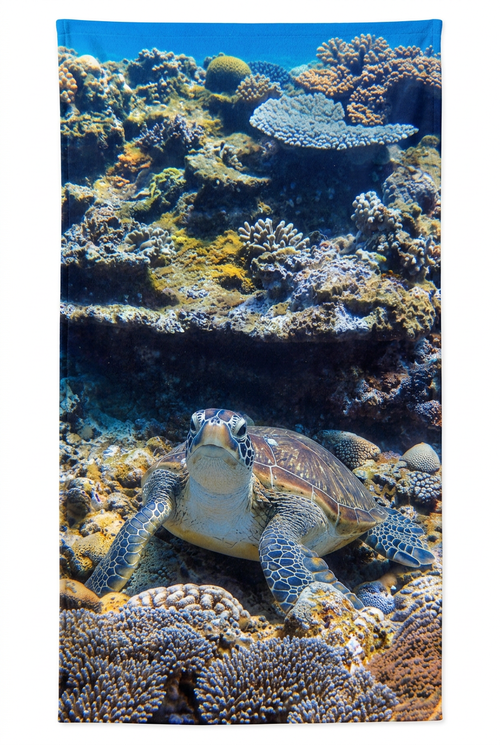 Concept mockup of a towel printed with a sea turtle and coral reef photograph